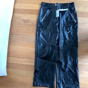 Unworn vinyl pants.